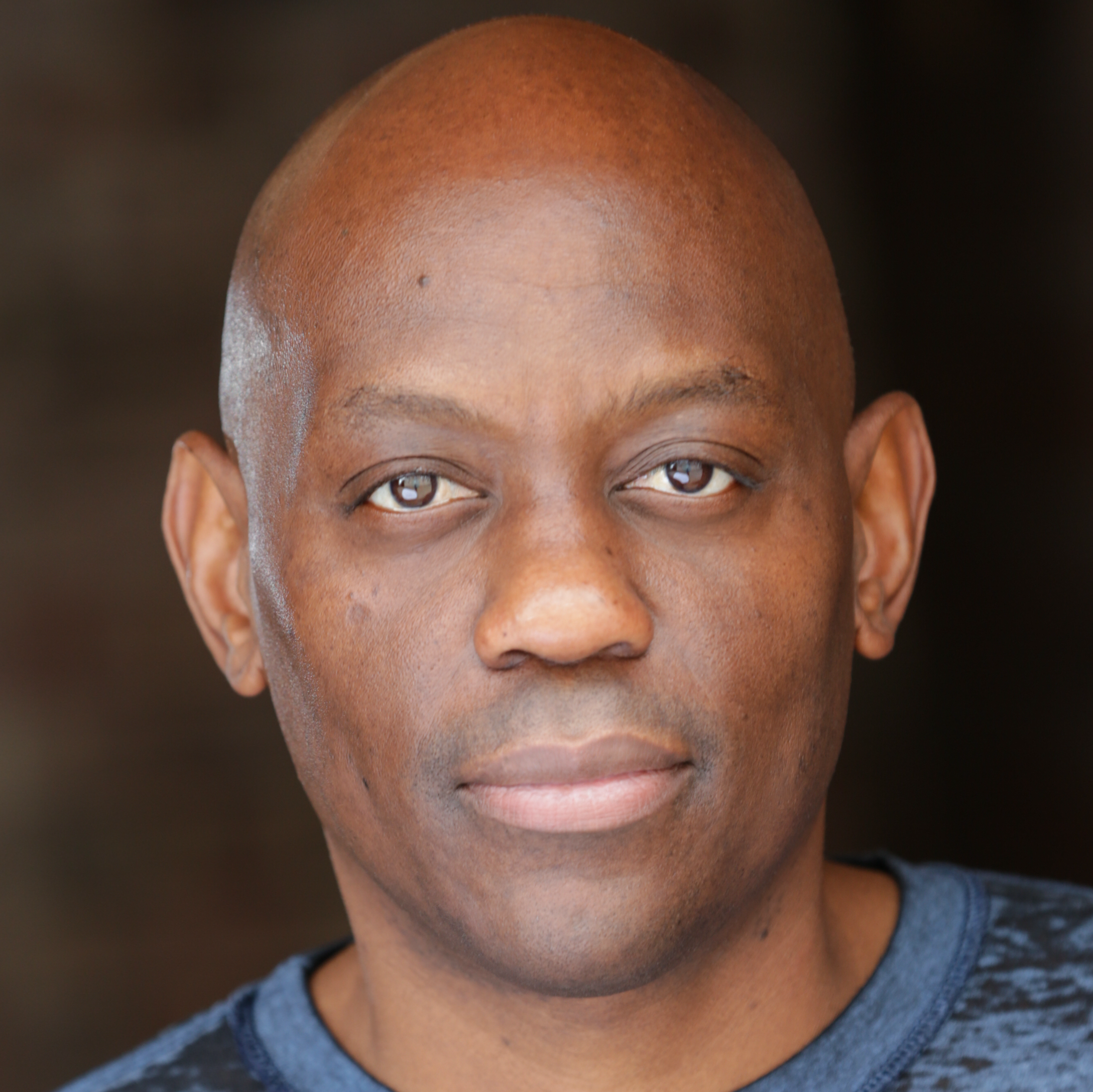 [ID: headshot of Ronnie Hill. End ID.]