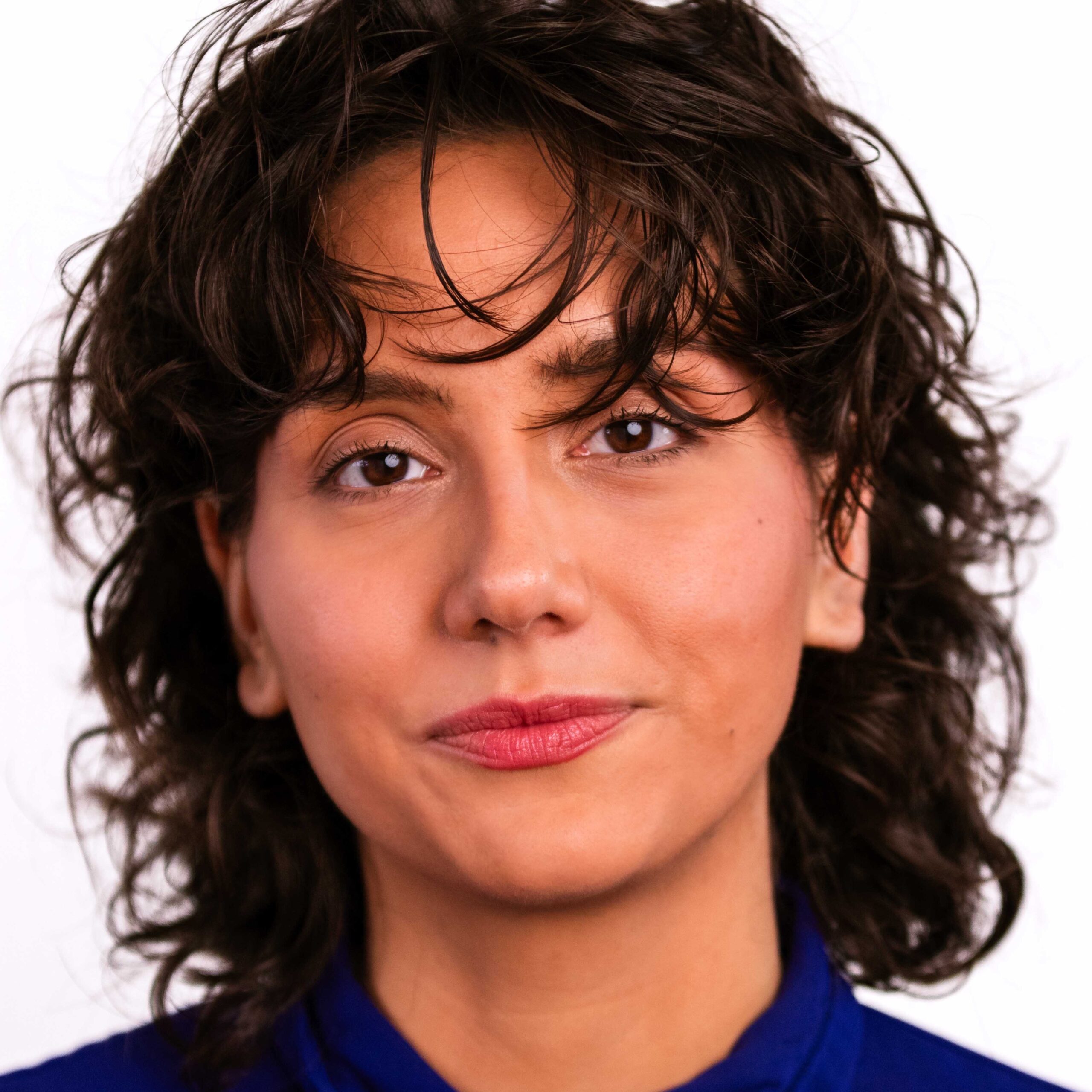 [ID: headshot of Tatyana Emery. End ID.]