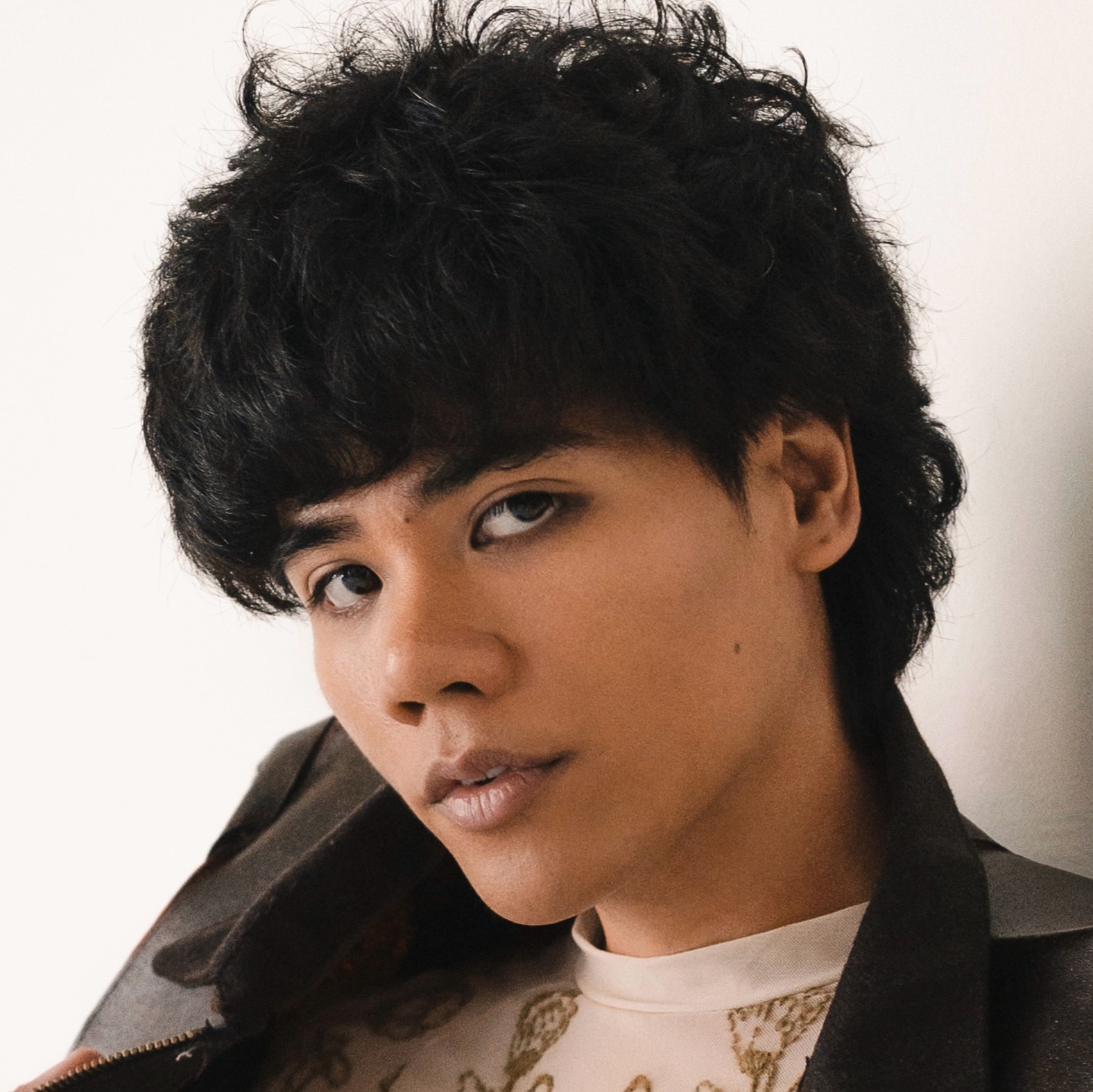 [ID: headshot of Ejay Amor. End ID.]